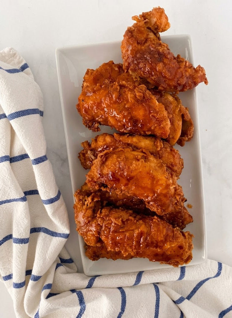 Nashville Hot Chicken Tenders with Homemade Buttermilk Ranch and Potato Wedges